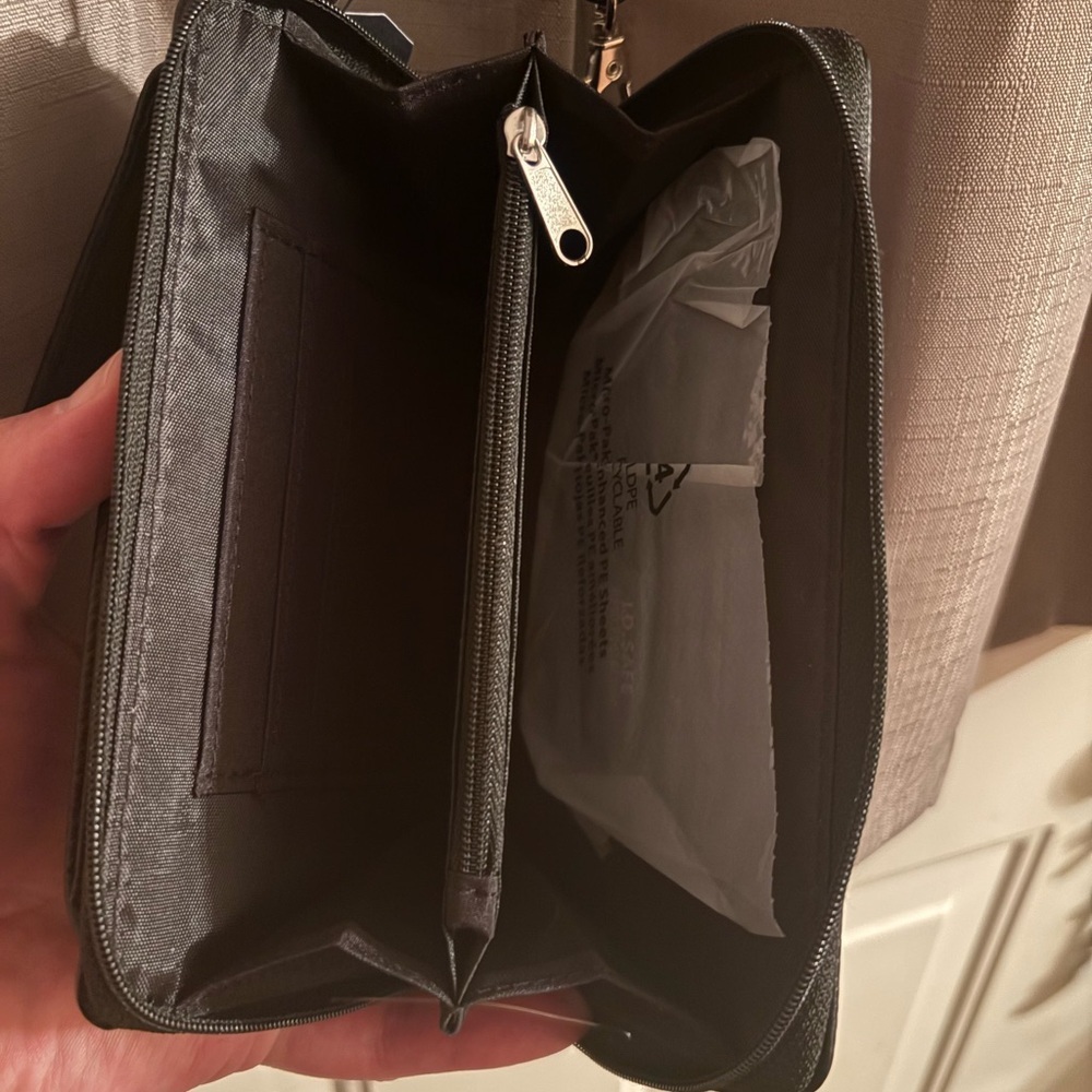 Nautica black wallet and cell phone case with adjustable strap. - Picture 3 of 7